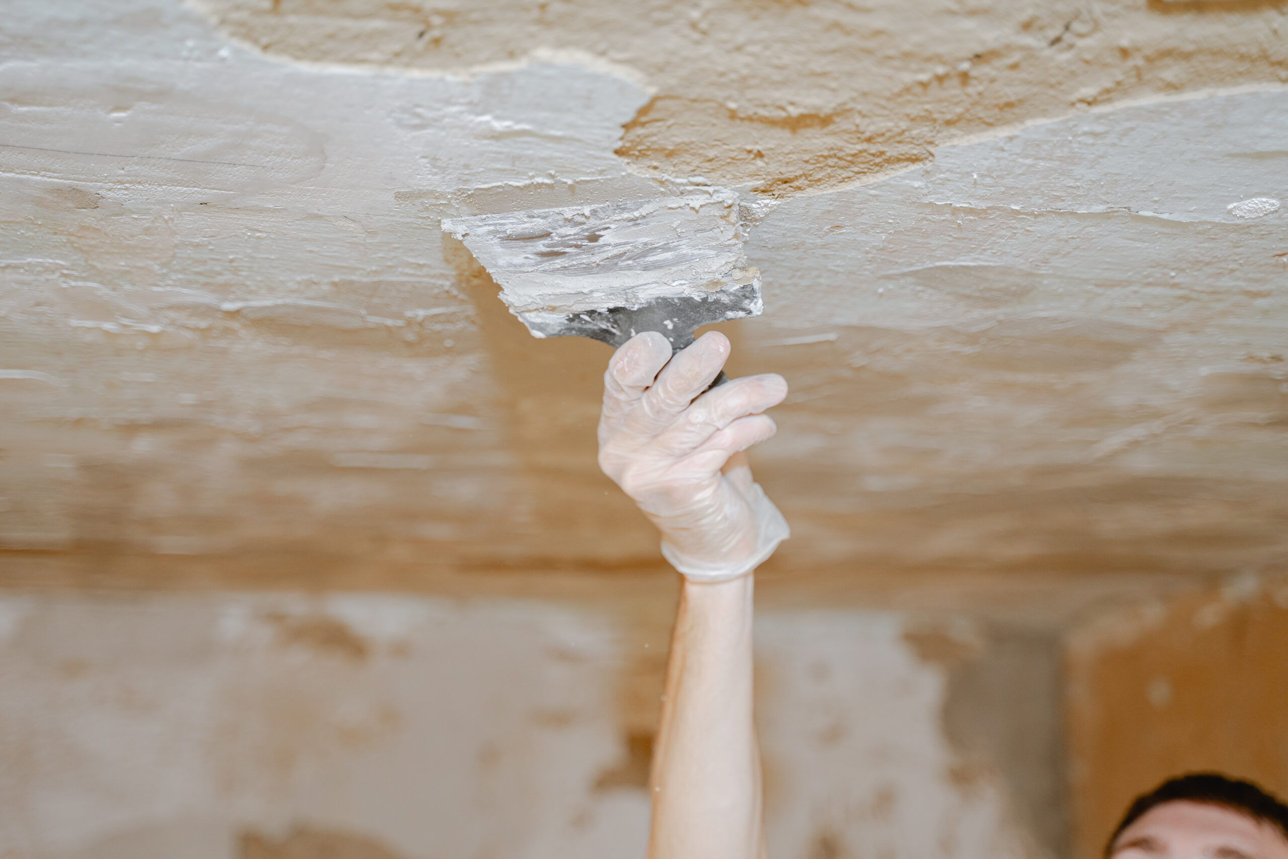 Fix Ceiling Water Damage and Stop Leaks Before They Start - Corner Flaking off - Cover in layer